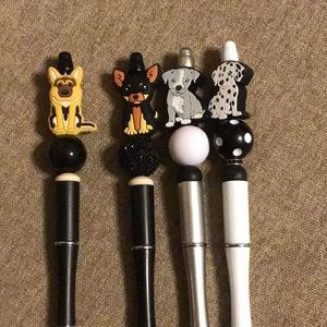 These are cute assorted dog beaded pens they are each sold separately